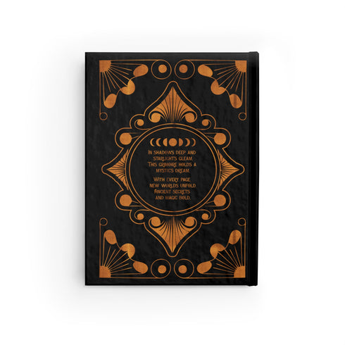 Luxurious black Grimoire with golden celestial patterns. Front reads "GRIMOIRE: A Treasury of Personal Enchantments". Back features mystical poem